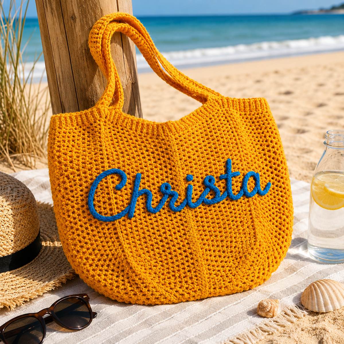 Strandveske oransje med brodert navn